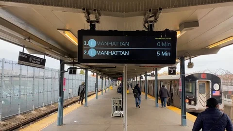 Brooklyn Subway L Train Boarding Announcement and Digital Display Update Stock Footage 127014645
