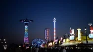 Brooklyn's Coney Island Boardwalk Amusement Park Neon Lights On A Summer Night Stock Footage