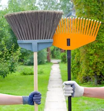 Broom and rake Stock Photos