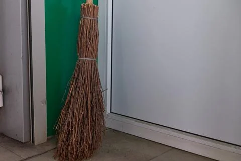 Broom in the corner. Stock Photos