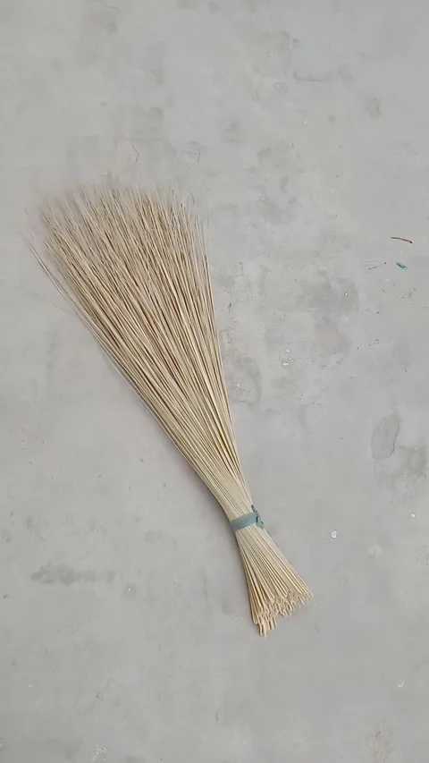 Broom made of grass and straw used for sweeping floors Stock Footage 322039856