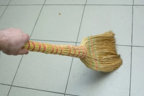 Brooms on the floor Stock Photos