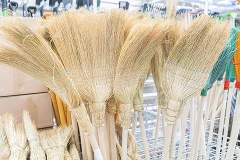 Brooms in the store close-up. as background Stock-Fotos