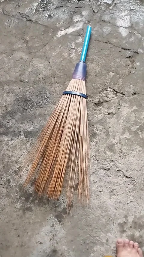 Broomstick for sweeping in the backyard Stock Footage 293119542