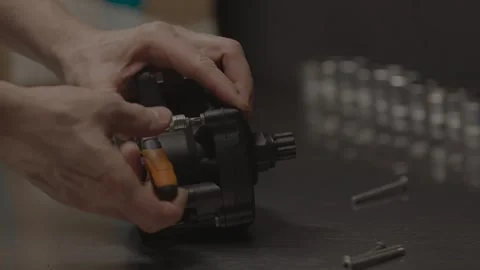 Brose E-Bike Motor Fast Bolt Unscrewing and Cover Rotation – Real Sound Stock Footage 329633375