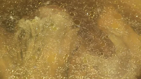 A broth that boils in detail when cooked in a saucepan. Soup, jellied meat. Stock Footage 152861776