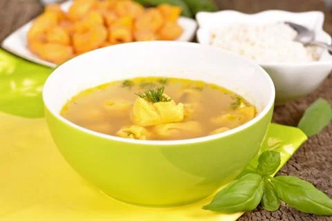Broth with tortellini Stock Photos