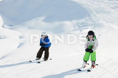 Brother And Sister Skiing, Les Arcs, Haute-Savoie, France