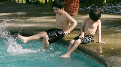 Brothers Splashing in Pool (HD) Stock-Footage 11183063