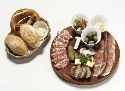 Brotzeit cold cuts meat sharing platter on white background Stock Photos