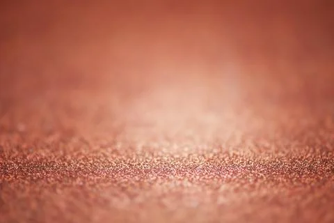 Brown abstract background with defocus and thin focal part. The glitter is .. Stock Photos