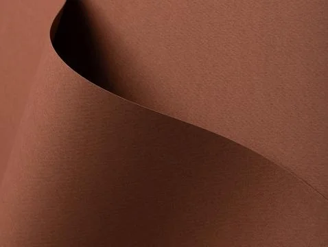Brown abstract folded surface with smooth curves. Minimal textured background Stock Photos