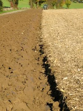 Brown Acre with Tractor Stock Photos
