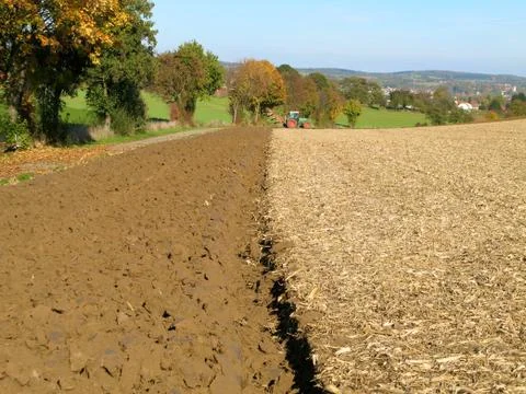 Brown Acre with Tractor Stock Photos