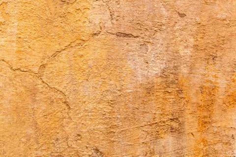 Brown adobe clay wall texture background. Stock Photos