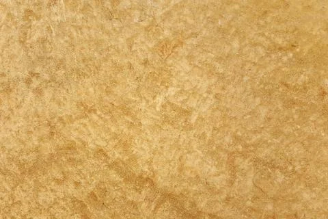 Brown adobe clay wall texture background. Stock Photos