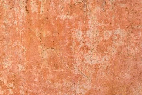 Brown adobe clay wall texture background. Stock Photos
