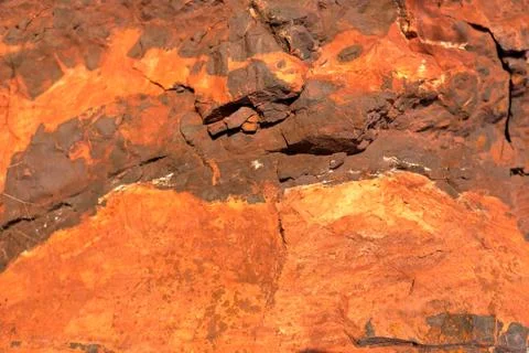 Brown and orange abstract pattern. Nature stone texture. Stock Photos