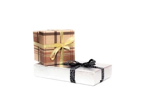 Brown and silver gift box with bow on white background Stock Photos
