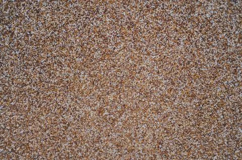 A brown and white background with small sand in the middle Stock Photos