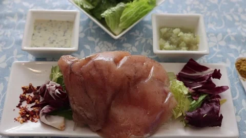 Brown and white Easter eggs decorated in the form of unicorns on a green and Stock Footage 149753813