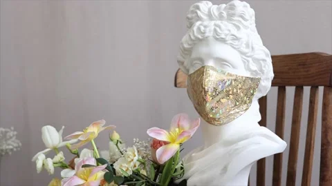 Brown and white Easter eggs decorated in the form of unicorns on a green and Stock-Footage 149754213