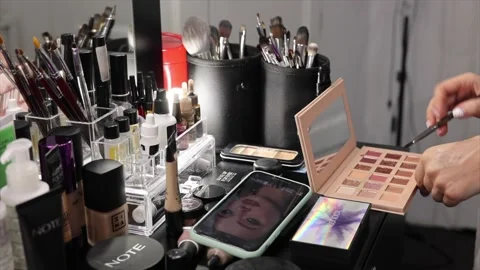 Brown and white Easter eggs decorated in the form of unicorns on a green and Stock-Footage 149754331