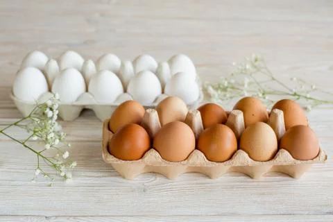 Brown and white eggs Stock Photos
