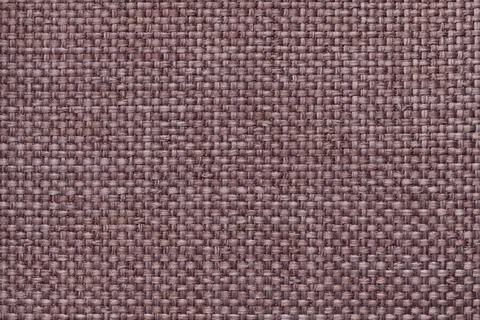 Brown background with braided checkered pattern. Texture of weaving fabric ma Stock Photos