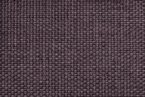 Brown background with braided checkered pattern. Texture of weaving fabric Stock Photos