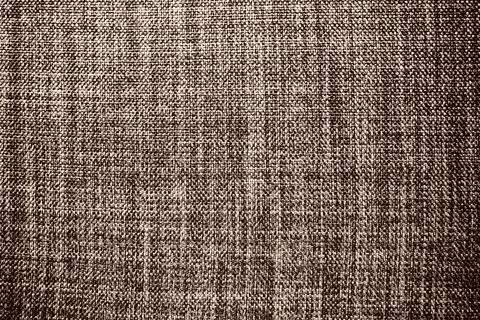 Brown background fabric texture. A piece of woolen cloth is neatly laid out on Stock Photos