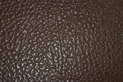 Brown background with old leather Stock Photos