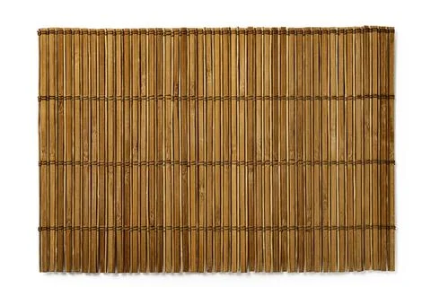 Brown bamboo table mat isolated on a white background. Old wooden luncheon mat. Stock Photos