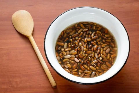Brown Beans in Water Stockfoto's