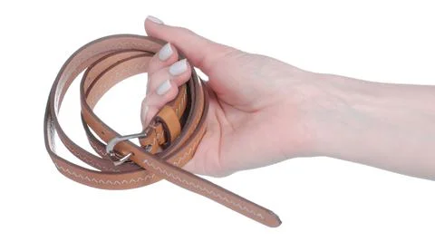 Brown belt accessory in hand Stock Photos
