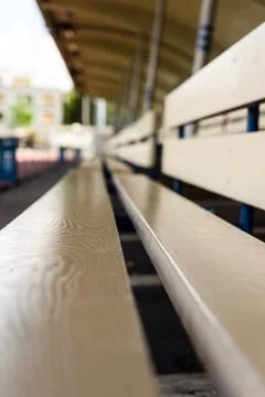 Brown bench in stadium Stock Photos