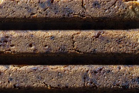 Brown biscuit texture closeup full frame background Stock-Fotos
