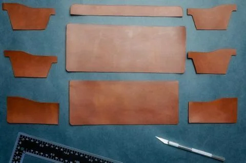 Brown blanks pattern made of genuine leather for men's wallet, handmade on a  Stock Photos