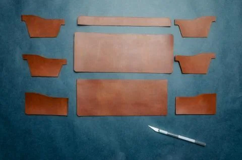 Brown blanks pattern made of genuine leather for men's wallet, handmade on a  Stock Photos