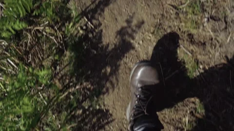 Brown boots walking quickly along a hiking trail 스톡 동영상 131673481