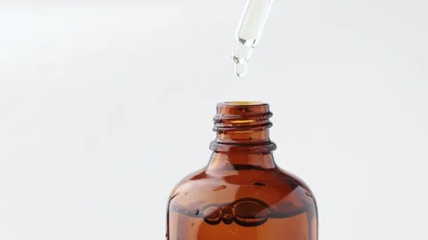Brown bottle with essential oil close-up. Stock Footage 170476507
