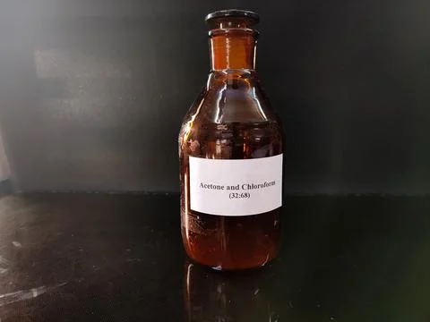 Brown bottle filled with reagent solution Foto stock