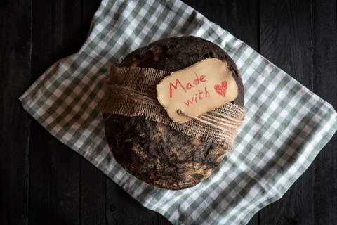 Brown bread flat lay image. Crusty rye-bread above view Stock Photos