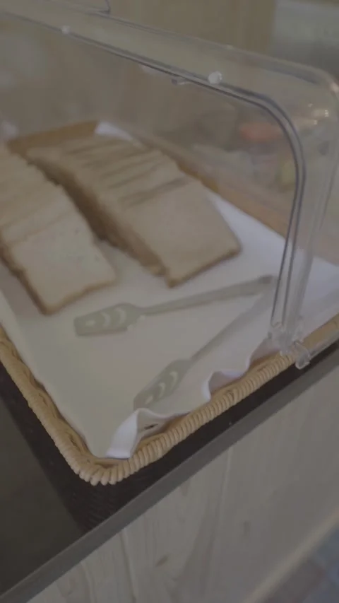 Brown Bread with serving tongs Stock Footage 313031235