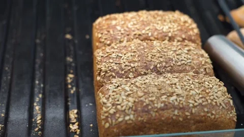 Brown bread in the supermarket Stock Footage 256240364