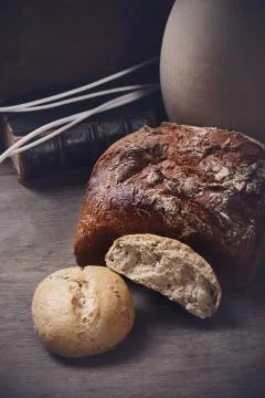 Brown bread on a wooden table Stock Photos