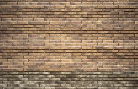 Brown brick background with gray border. Brick wall. Stock Photos