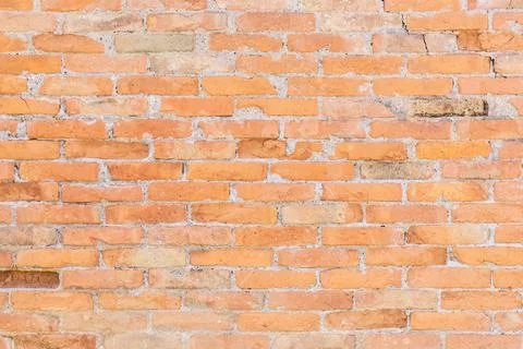 Brown brick wall background, old brick wall close up, textured, macro Stock Photos