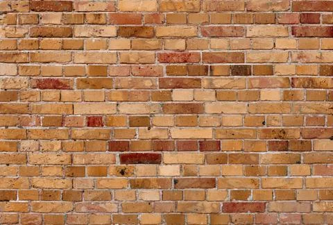 Brown brick wall for background Stock Photos