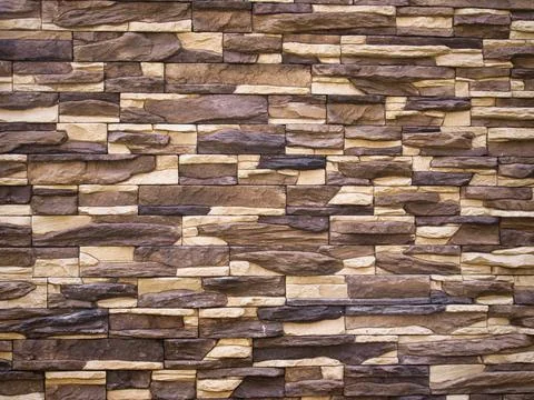 Brown brick wall. Brick wall as background Stock Photos